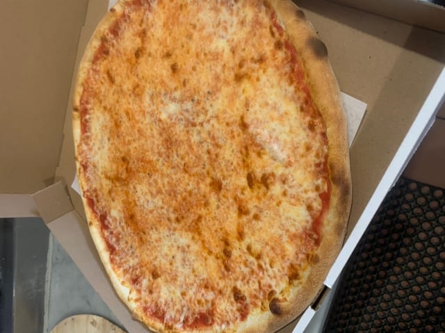 2 Large Cheese Pies Special.