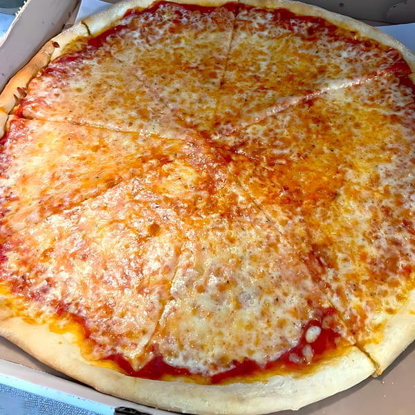 A large, cheesy 2 Brothers Pizzeria plain pizza, cut into slices, in a delivery box.